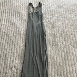 Rumer open back slit left leg. Sage green color.